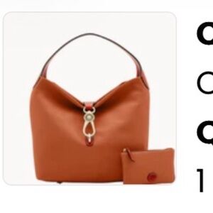 Dooney and bourke caramel lock logo shoulder bag with pouch and keychain.